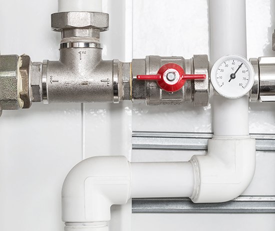 Detail of heating system in a boiler room, close up photo.
